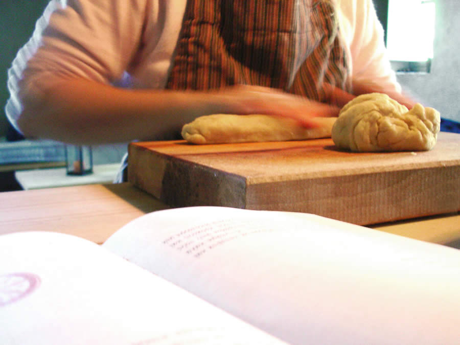 kneading tsoureki in Tinos