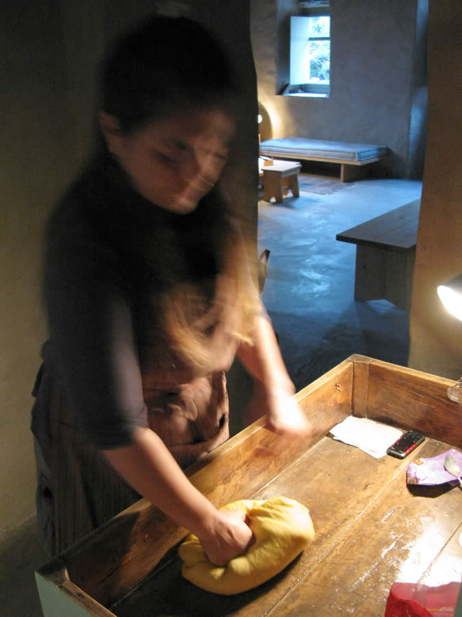 kneading tsoureki in Loutra rental house in Tinos